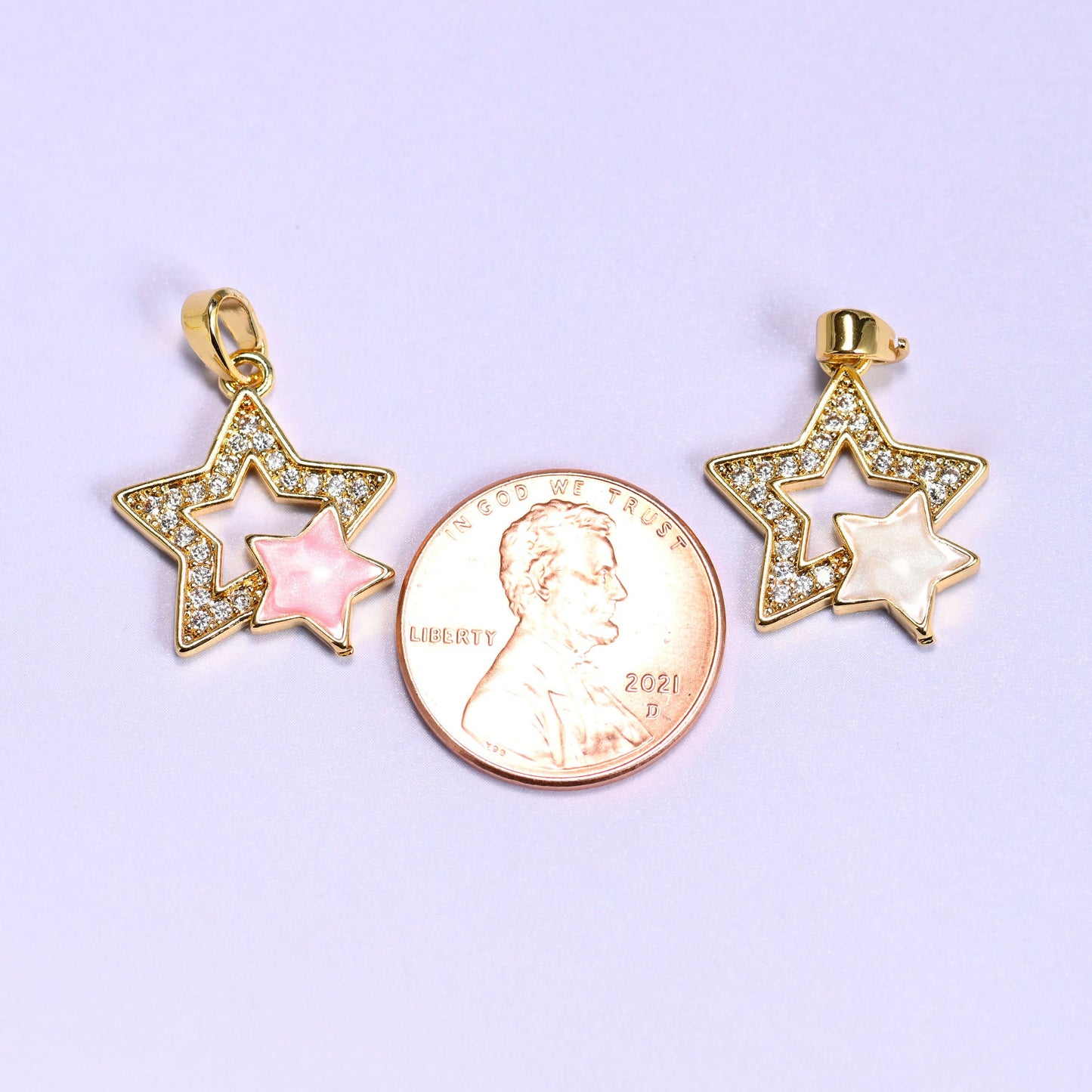 Double Stars Zircon Charms with a clear zircon pave outer star