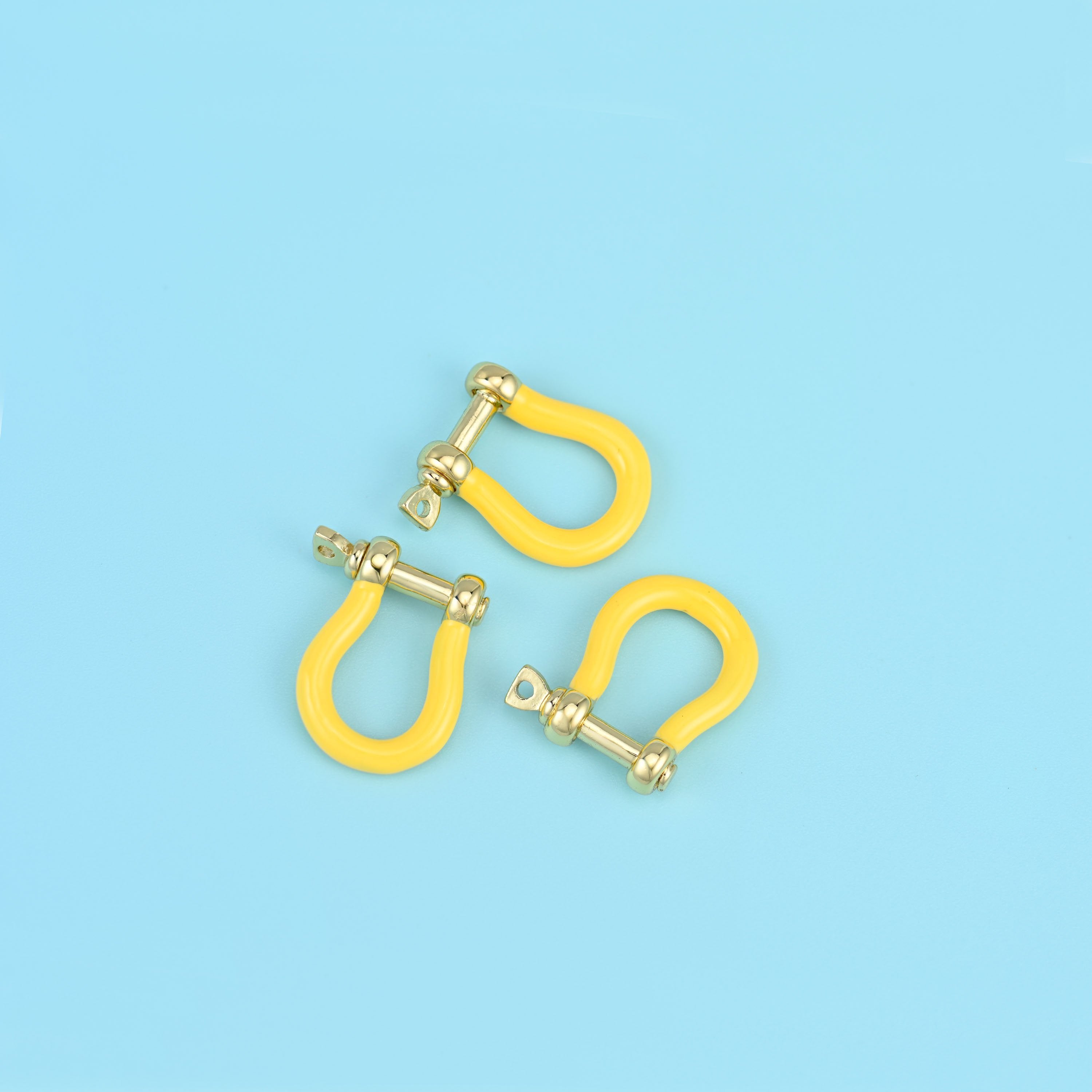 Brass and 18k gold filled horseshoe clasp with enamel detail