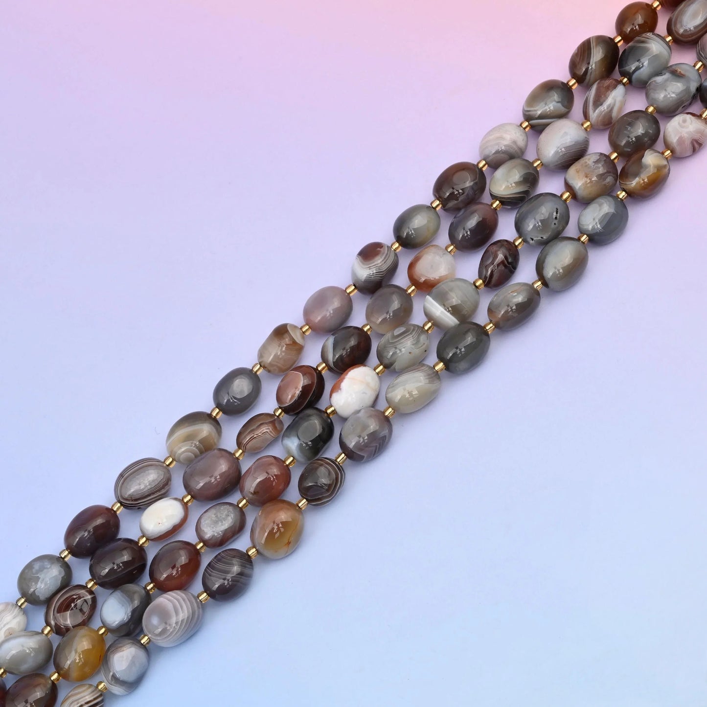 Botswana agate beads with an earthy, banded pattern