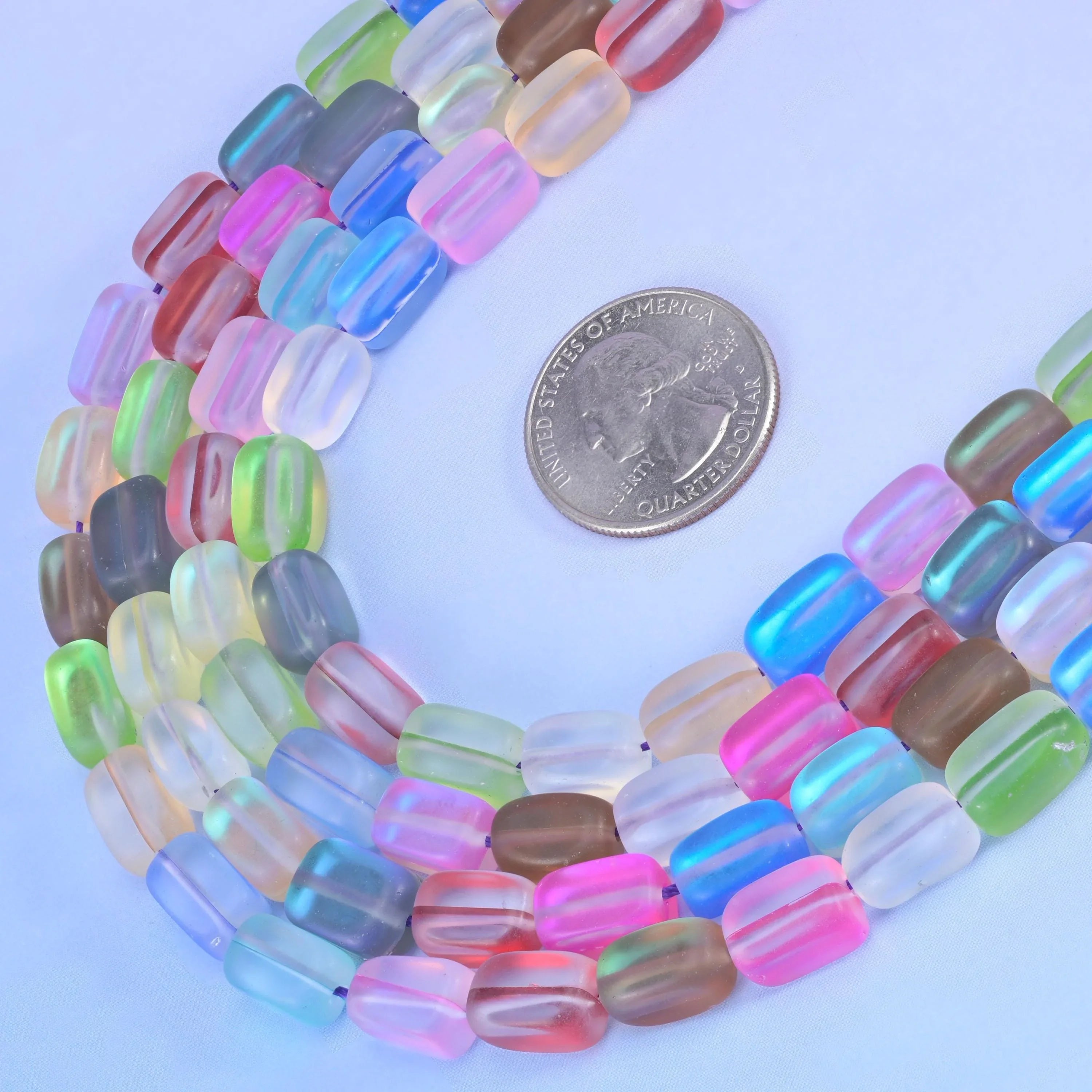 Rainbow Mystic Aura glass beads with a matte frosted finish and iridescent shine