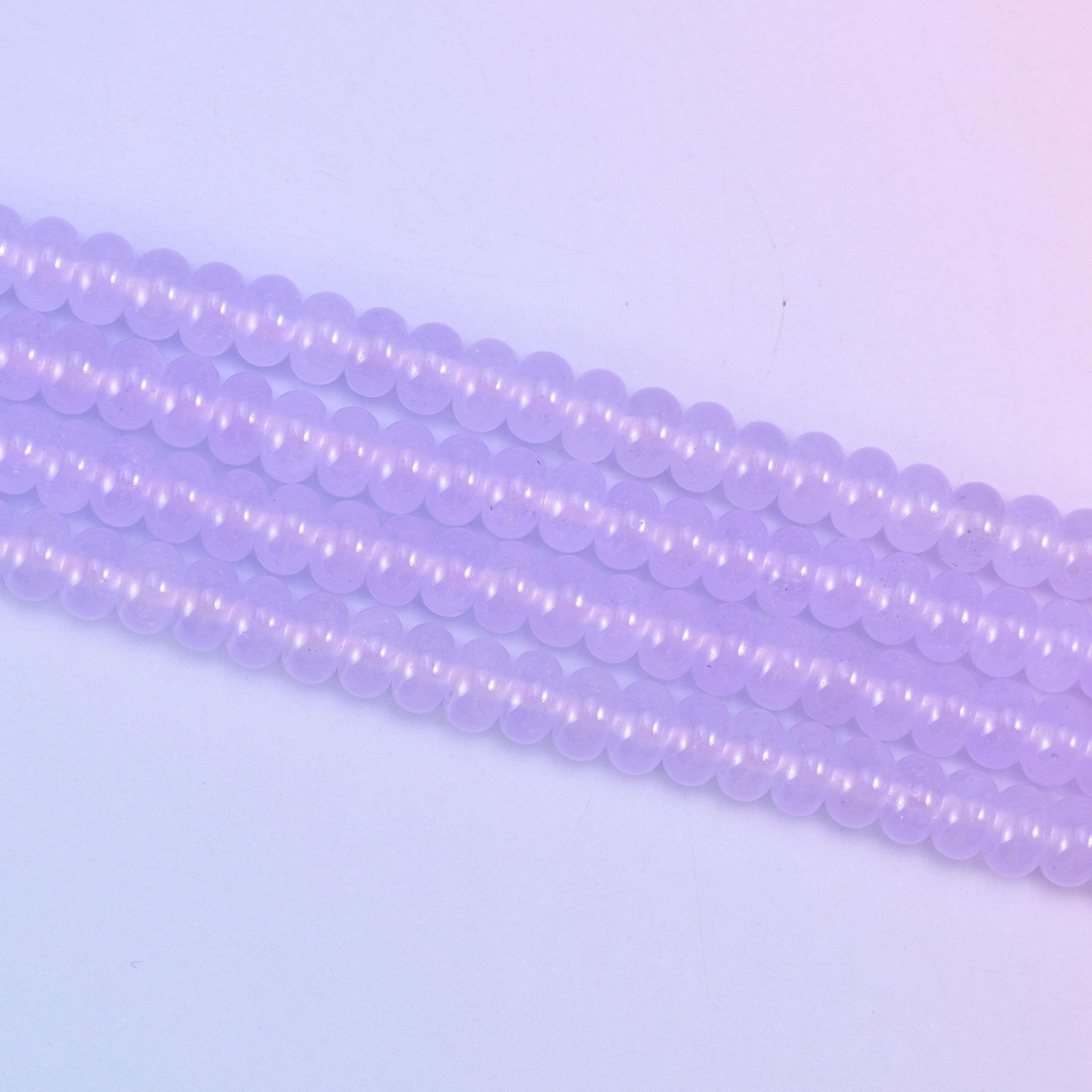Lavender Purple Dyed Jade beads in a soft, translucent lilac tone