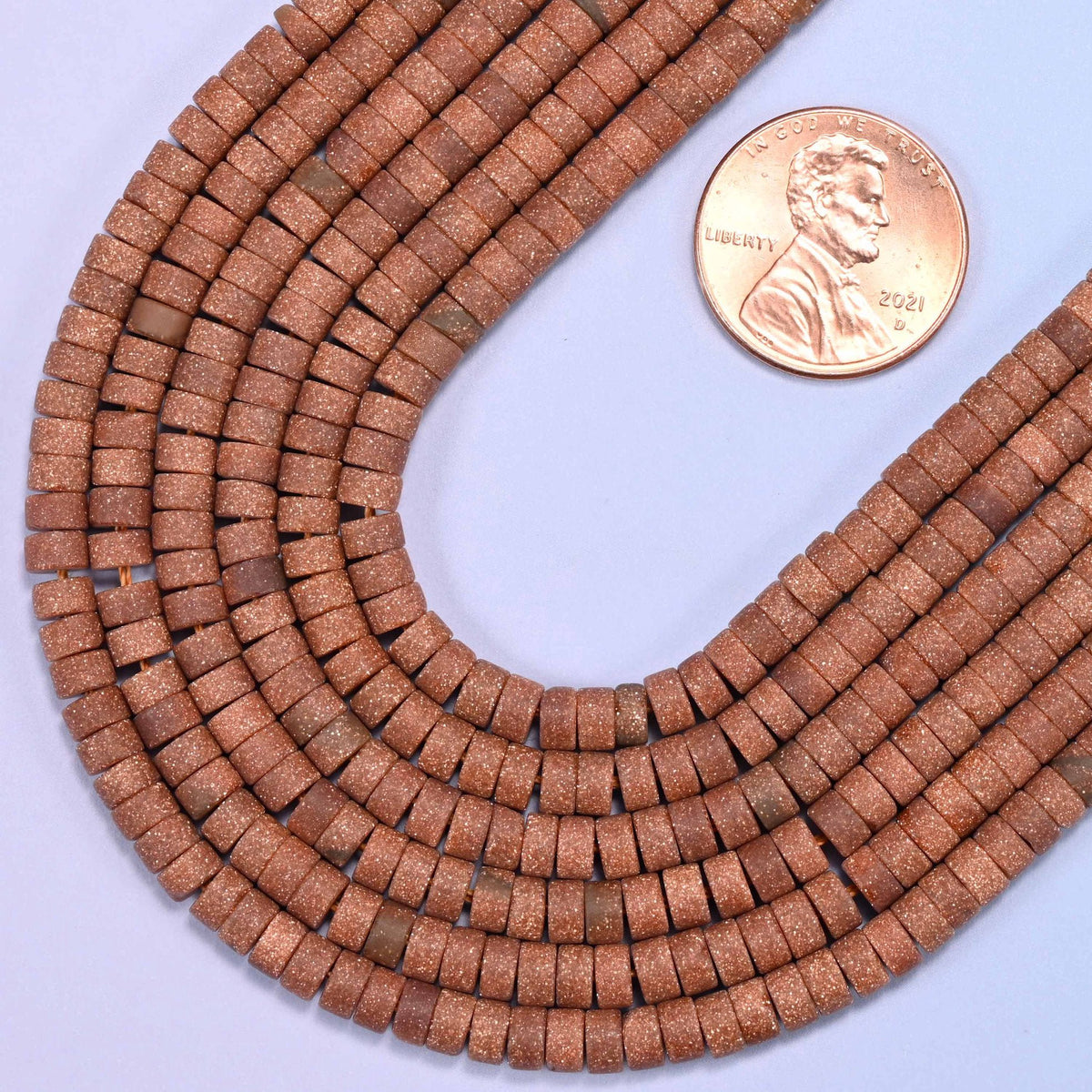 Heishi disc cut gold sandstone beads