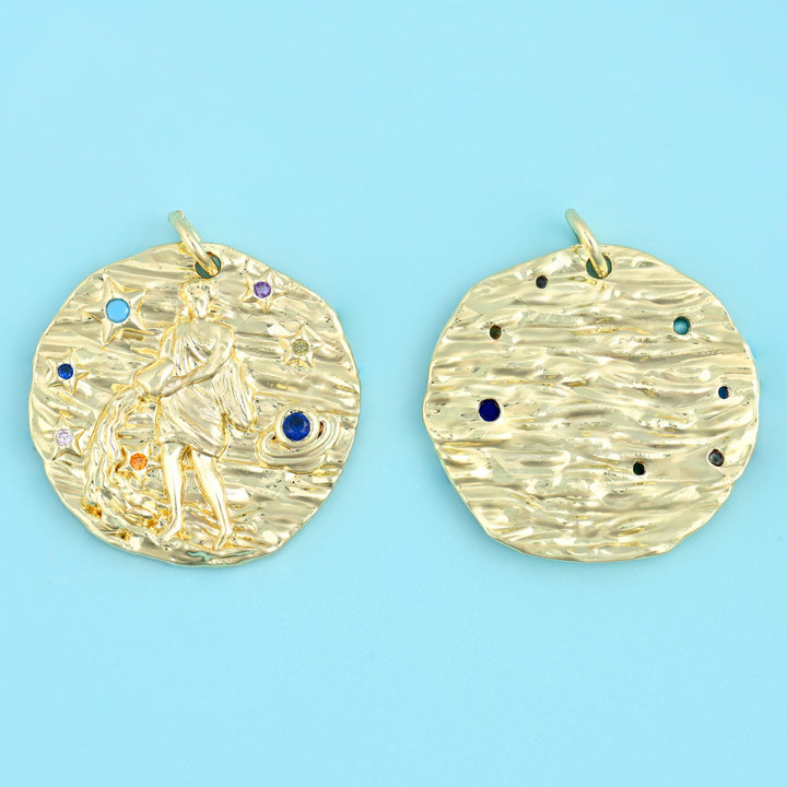18K gold plated zodiac pendant, front and back, hammered gold disc with a standing figure and coloured zirconia stones
