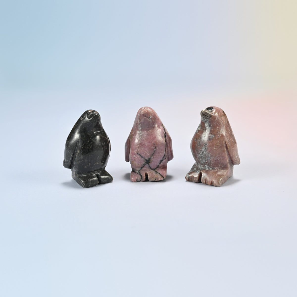 Three rhodonite penguin crystal carvings, 1.5 inch, pink and black natural stone