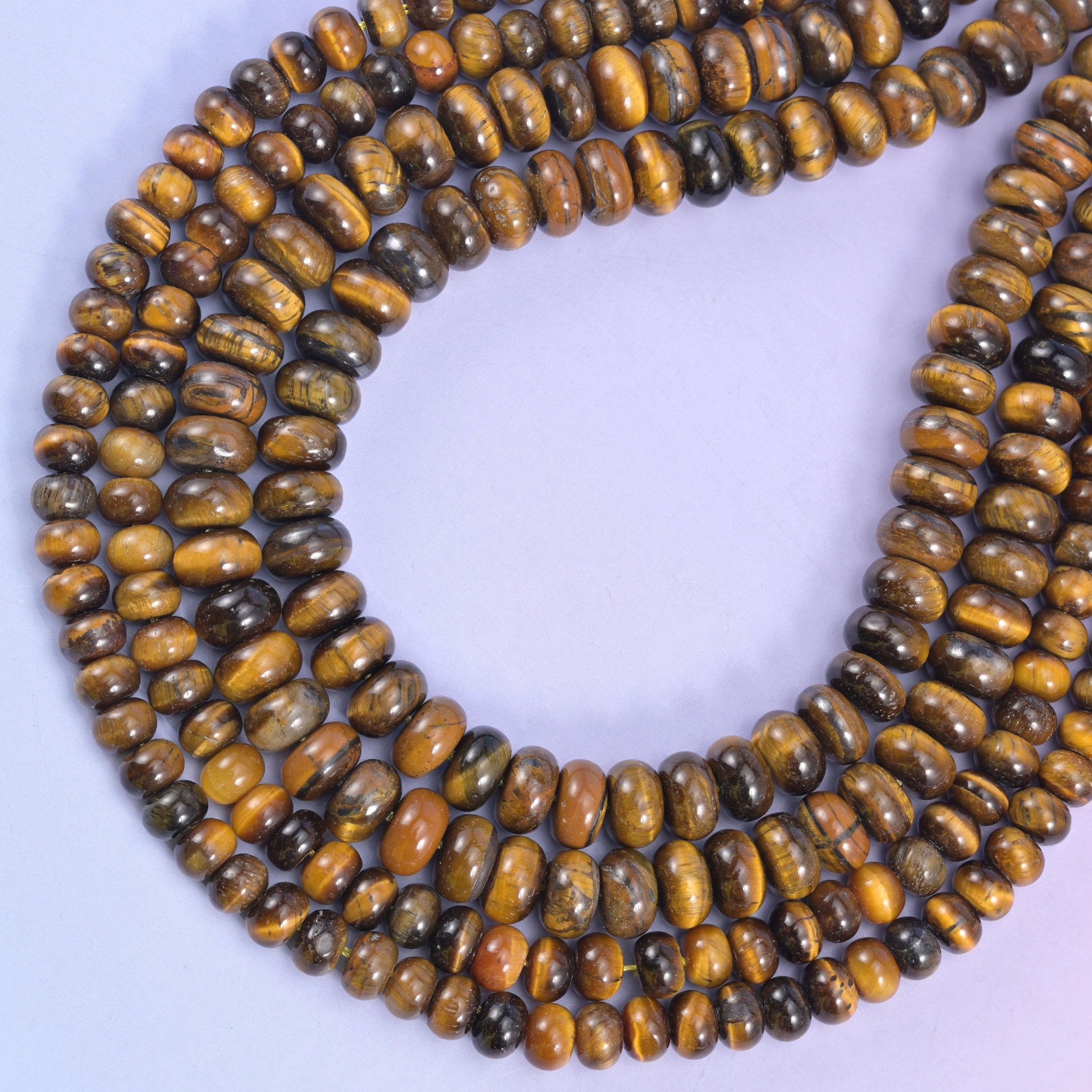 Tiger Eye rondelle beads, approximately 90 beads per strand