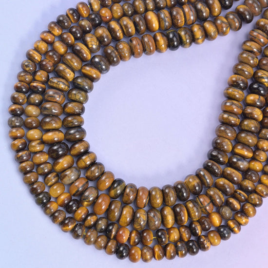 Tiger Eye rondelle beads, approximately 90 beads per strand