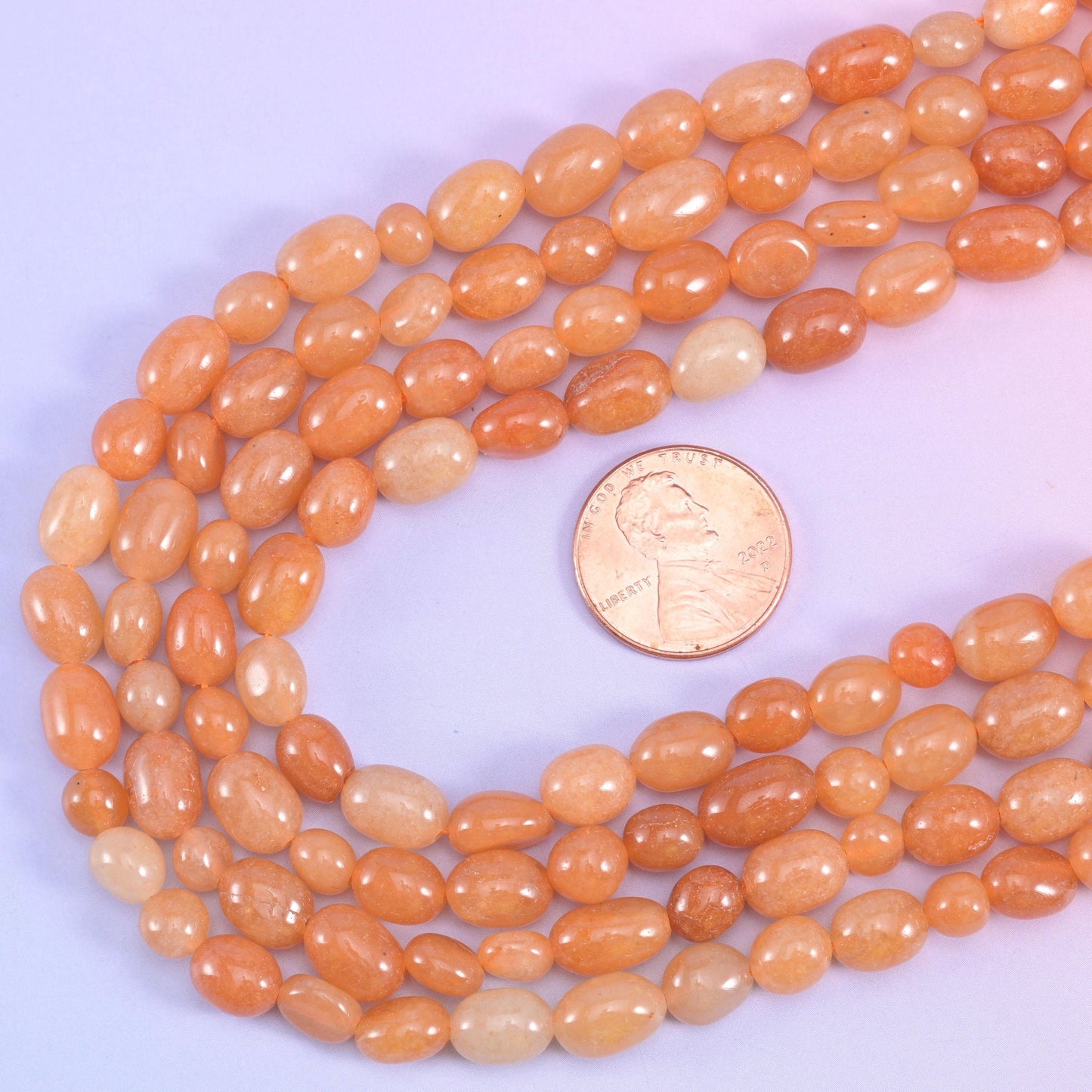 Red Aventurine Pebble Nugget Beads, warm apricot and soft terracotta, semi-translucent with paler cream patches