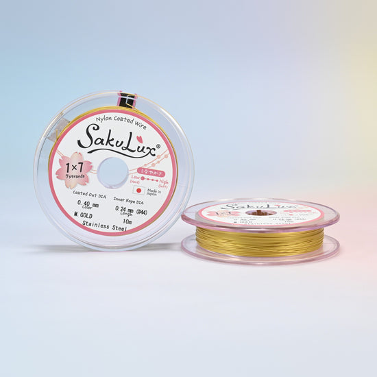 Two rolls of gold 0.4mm nylon coated stainless steel beading wire, 7 strand with 0.24mm inner wire, 10 meter roll