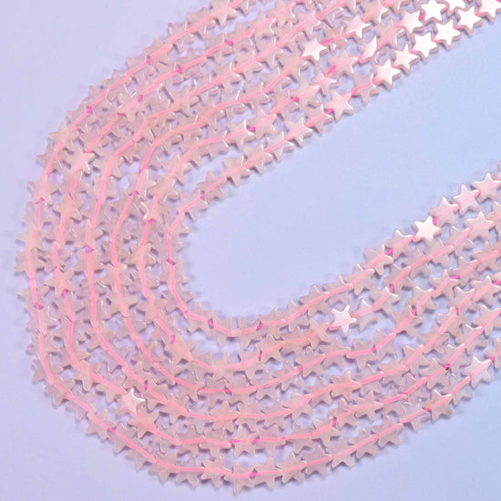 Rose quartz flat star beads, 15 inch strand