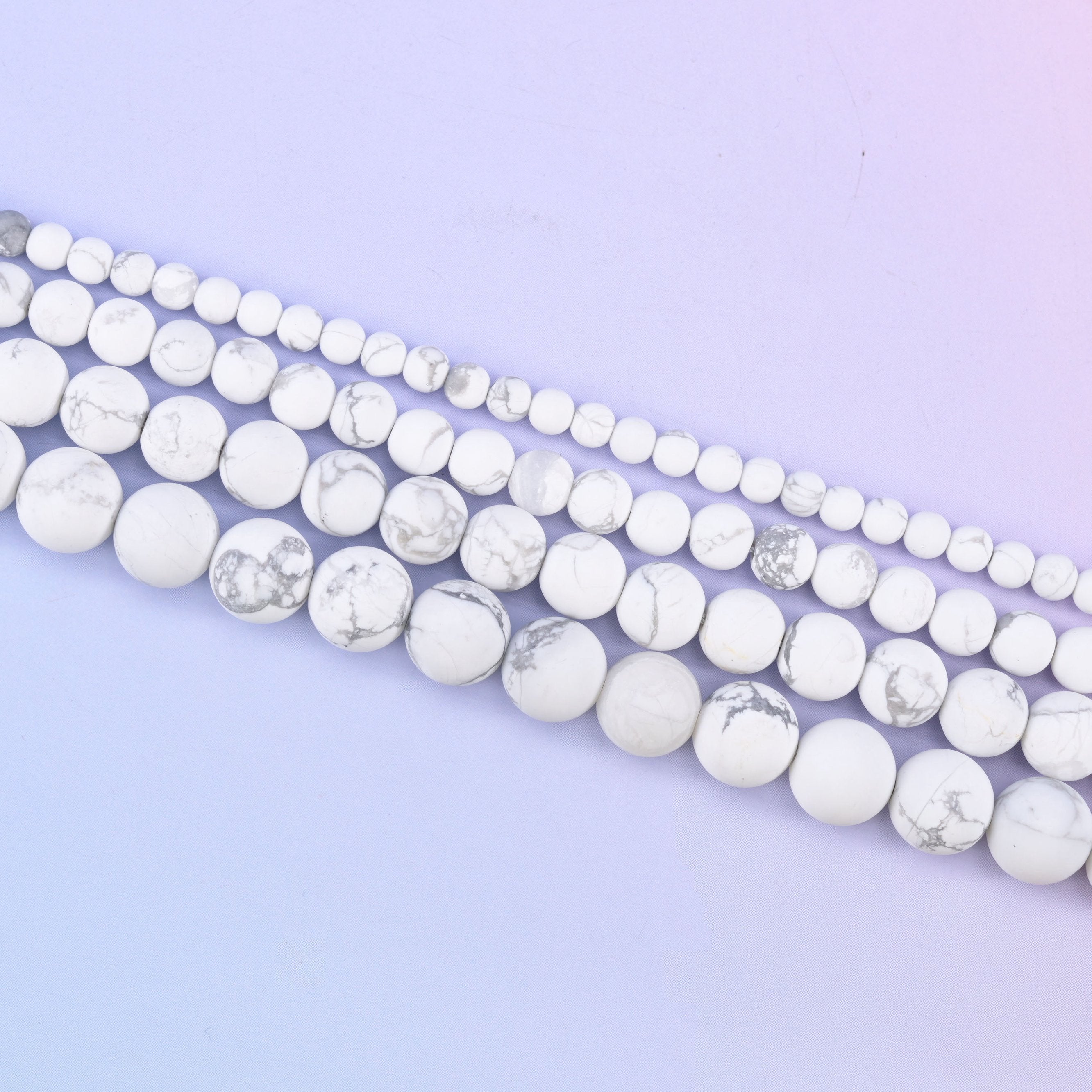White howlite matte round beads in chalk white with fine grey marbled veining