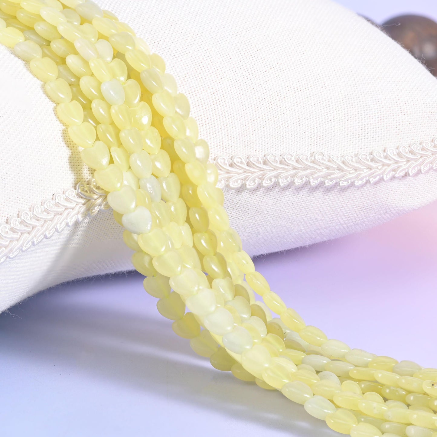 Lemon Jade Smooth Flat Heart Beads, soft buttery yellow with a smooth polished surface