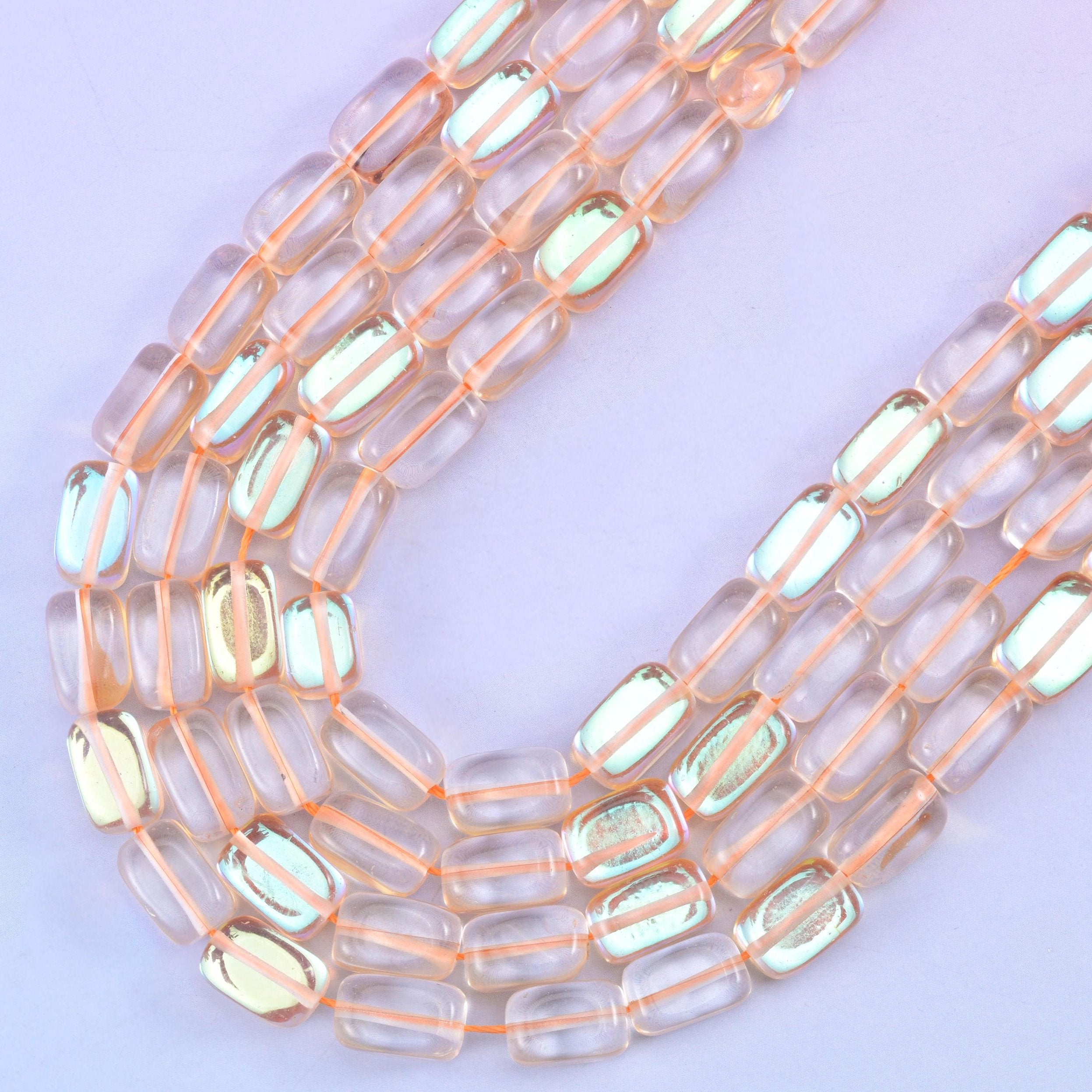 Orange Mystic Aura glass beads, center-drilled approximately 1.0mm hole