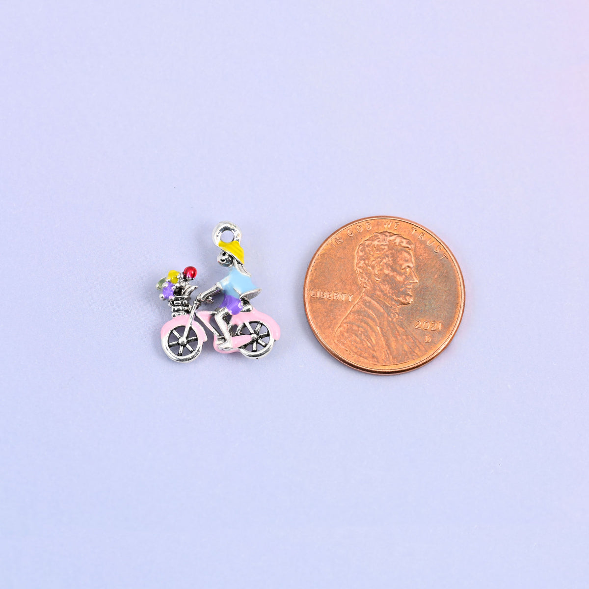 Bicycle charm shown at actual size, 16.42 x 13.79mm.
