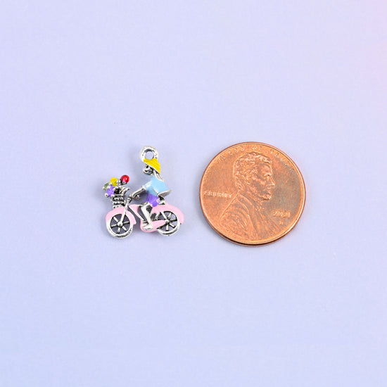 Bicycle charm shown at actual size, 16.42 x 13.79mm.