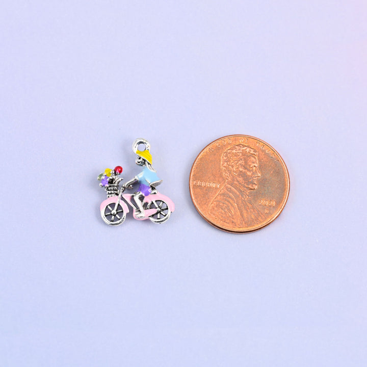 Bicycle charm shown at actual size, 16.42 x 13.79mm.