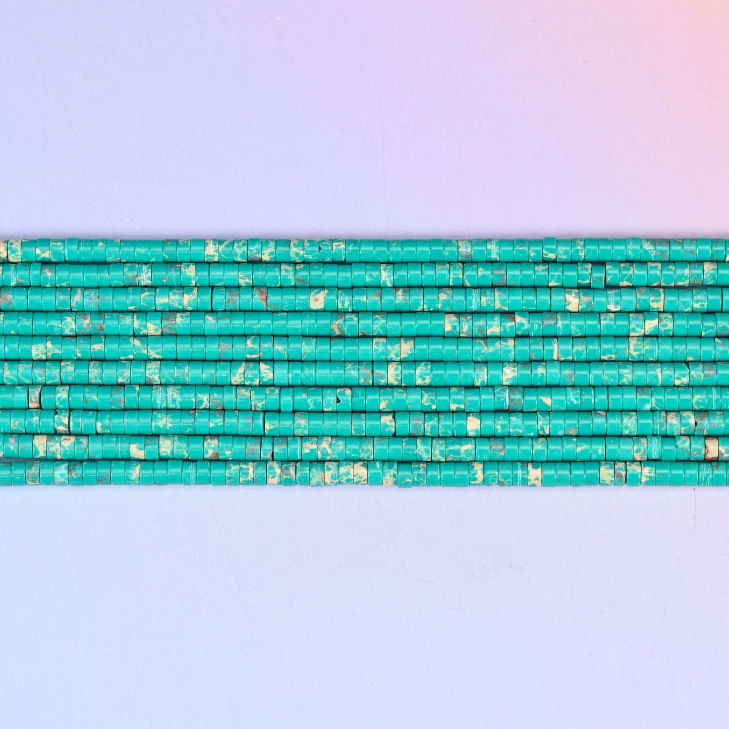 Green Shoushan Stone Smooth Heishi Disc Beads in turquoise-green with cream and rust mottling