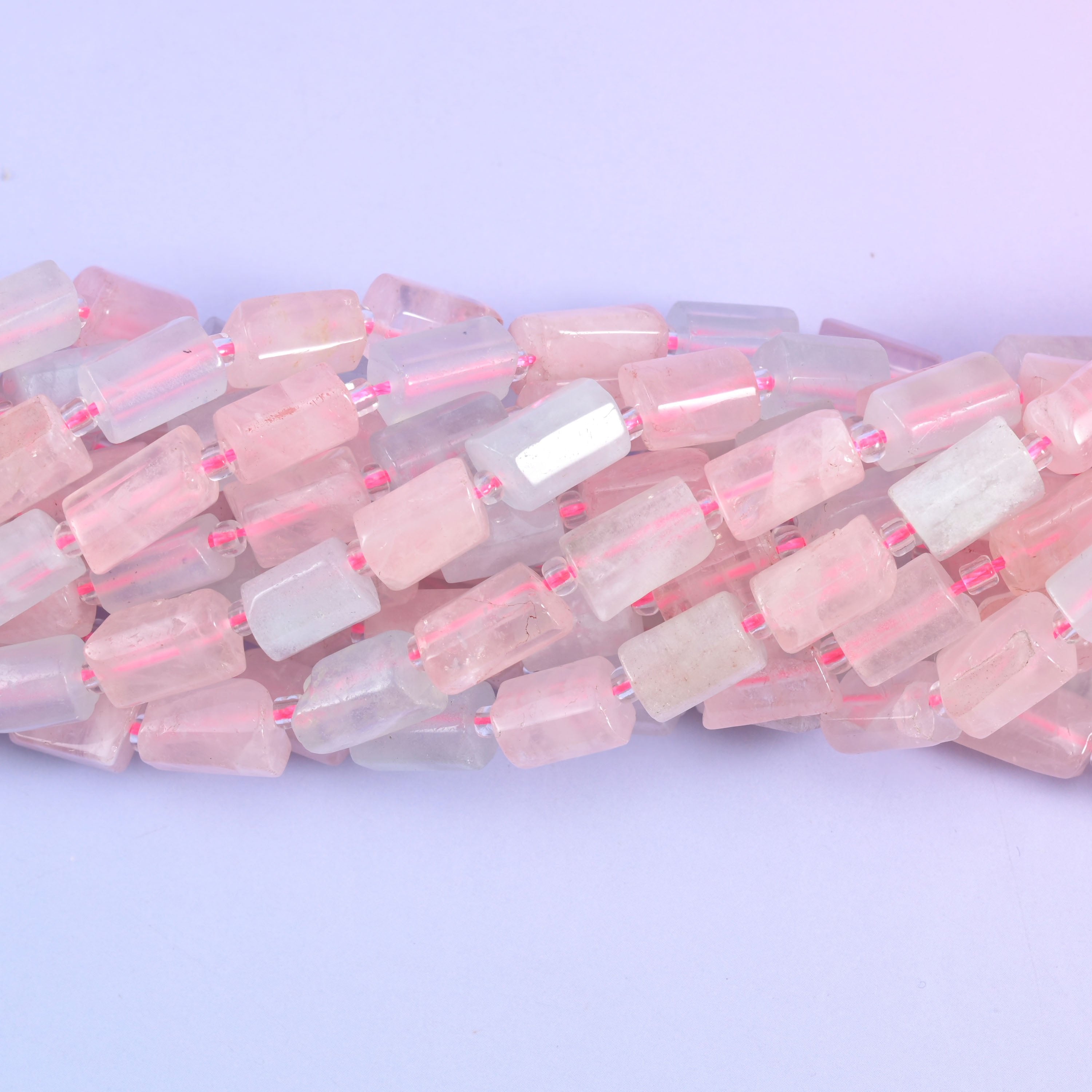 Faceted tube cut morganite beads.