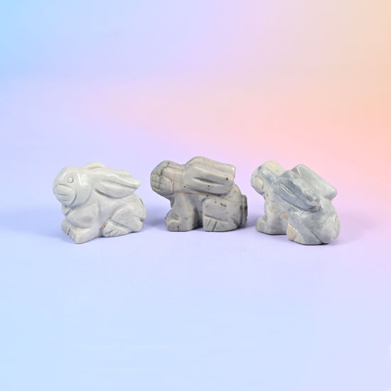 Laying down bunny carving offered in 47 gemstones, from deep green and cream to lilac, coral and blue