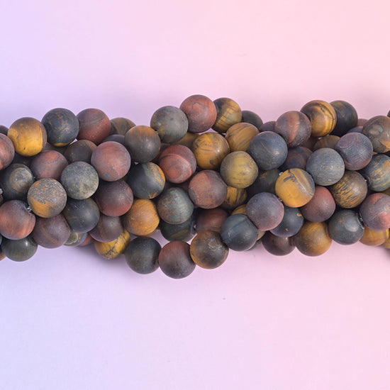 Round cut Tiger's Eye beads with a soft matte finish
