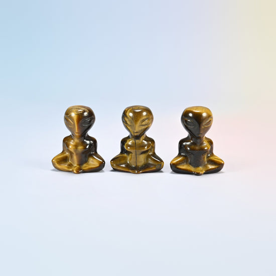 Three natural tiger eye yoga alien crystal carvings, 1.5 inch, golden brown