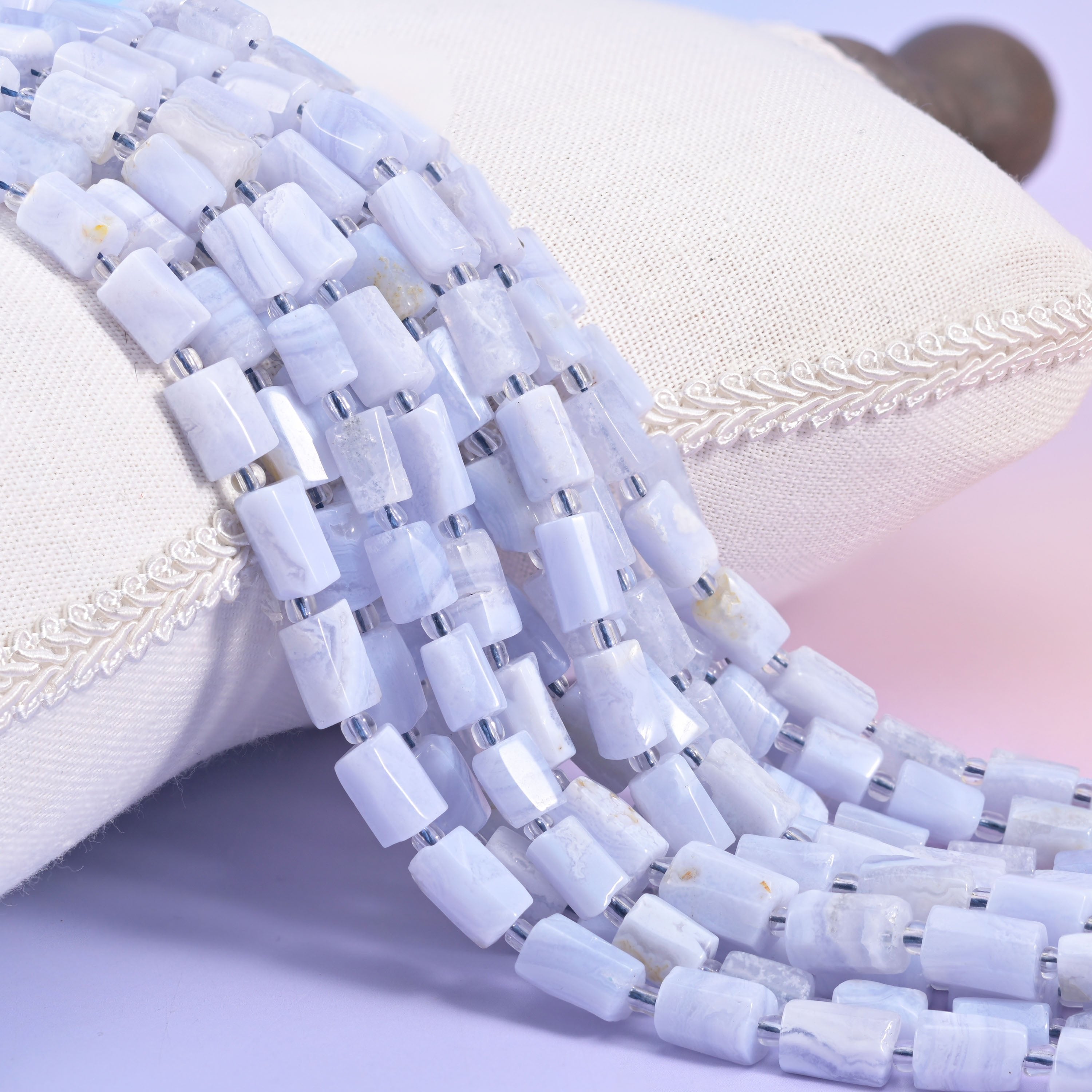 Blue Lace Agate Faceted Tube Beads, a sleek contemporary tube cylinder shape in a soft blue color.