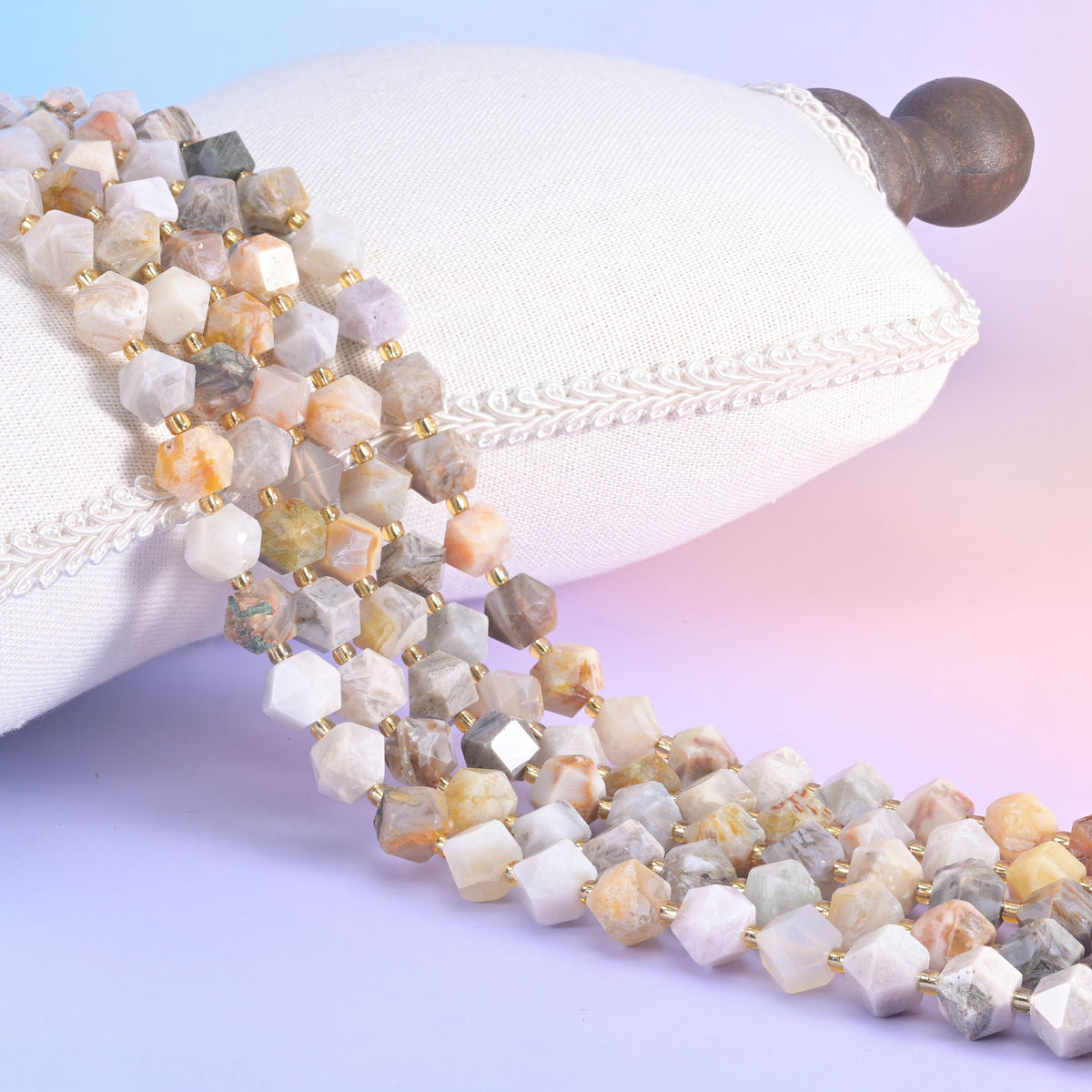 Faceted rhombus beads, centre-drilled, hole approximately 1.0mm with a +/- 0.2mm difference.