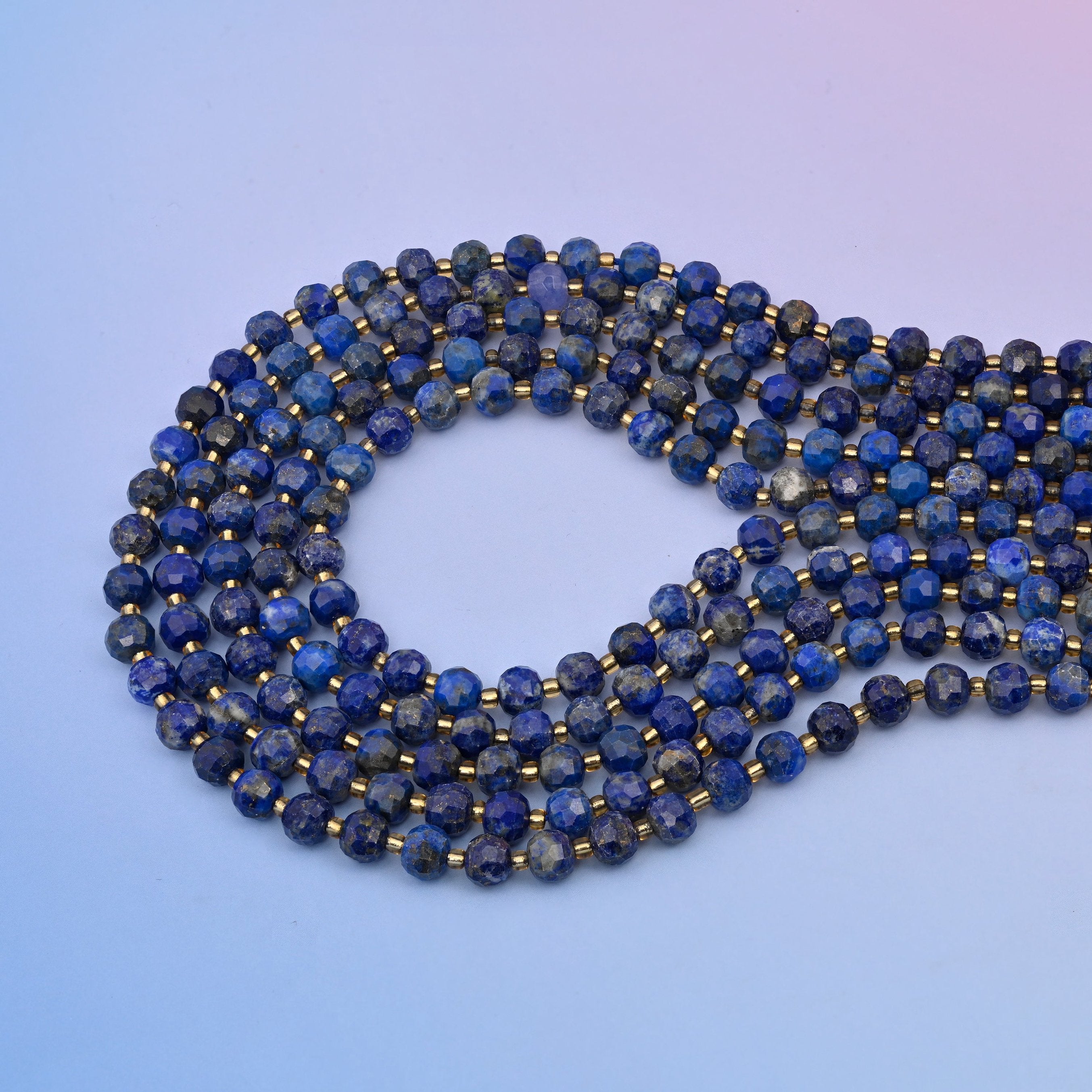 Natural blue lapis, deep royal blue marbled with grey-white calcite and gold pyrite flecks