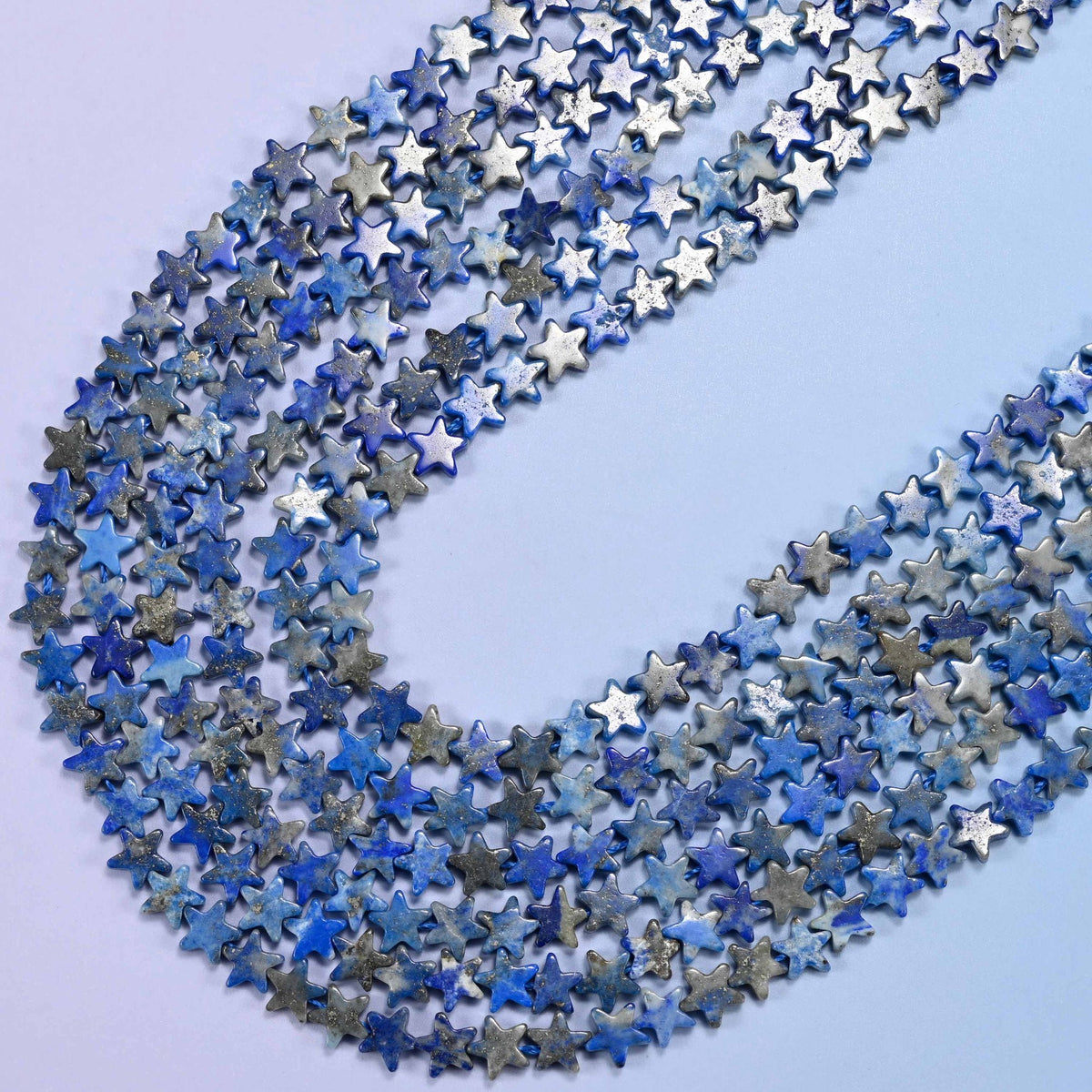 Lapis lazuli flat star beads, 15 inch strand
