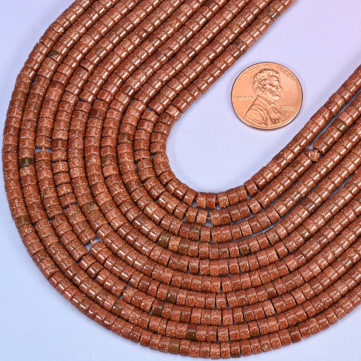Smooth heishi disc cut Gold Sandstone man-made glass beads