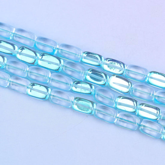 Light blue mystic aura beads in fresh aqua-blue with a subtle iridescent glow