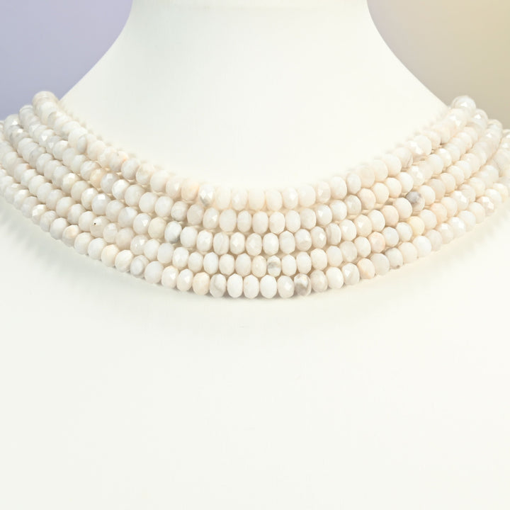 White Crazy Agate gemstone rondelle beads 4x6mm shown on a white neck display as a layered necklace