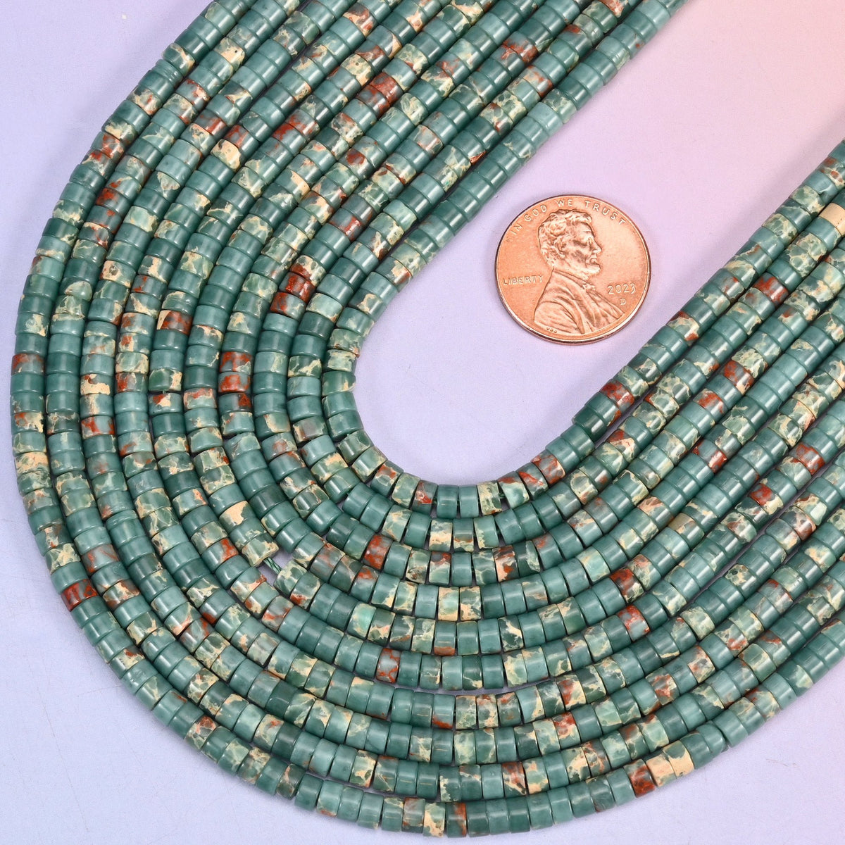 Smooth heishi disc cut sea sediment jasper beads