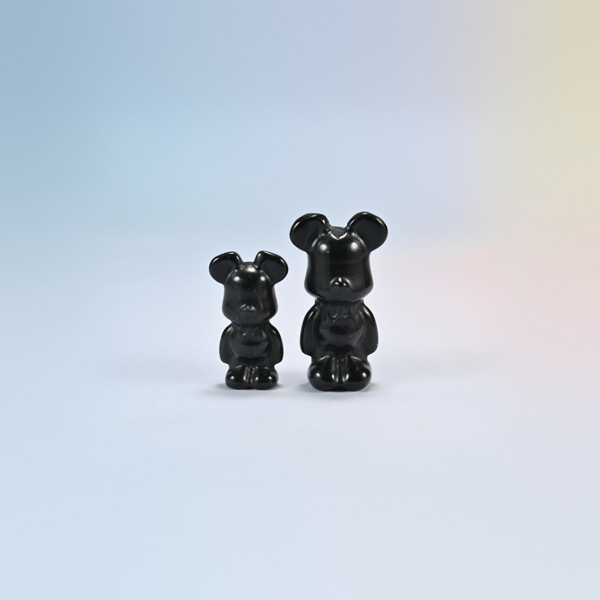 A 1.5 inch and a 2 inch black obsidian power bear crystal carving, glossy black natural stone