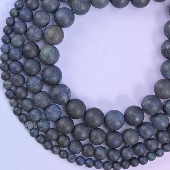 Dark blue dumortierite matte round beads, approximately 37 to 84 beads per strand depending on size