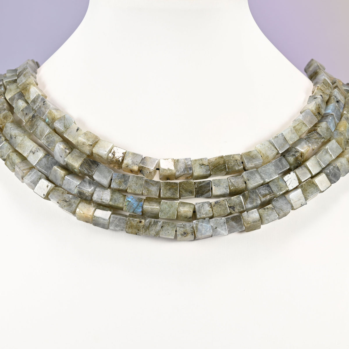 Gray Labradorite cube beads layered as a collar, several strands of 6mm cubes sitting square on the wire