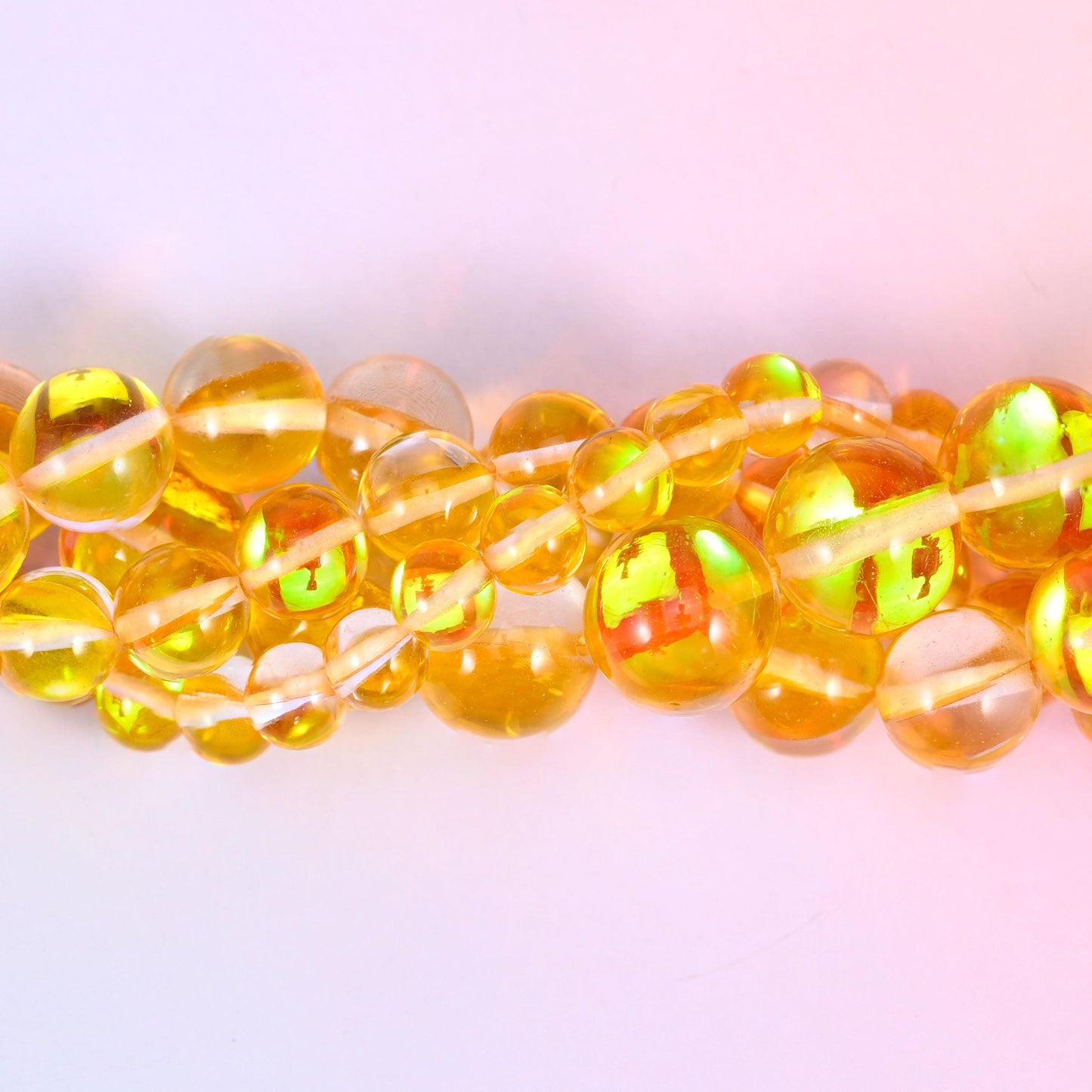 Mystic Aura Yellow Round Glass Beads, sold per 15 inch strand