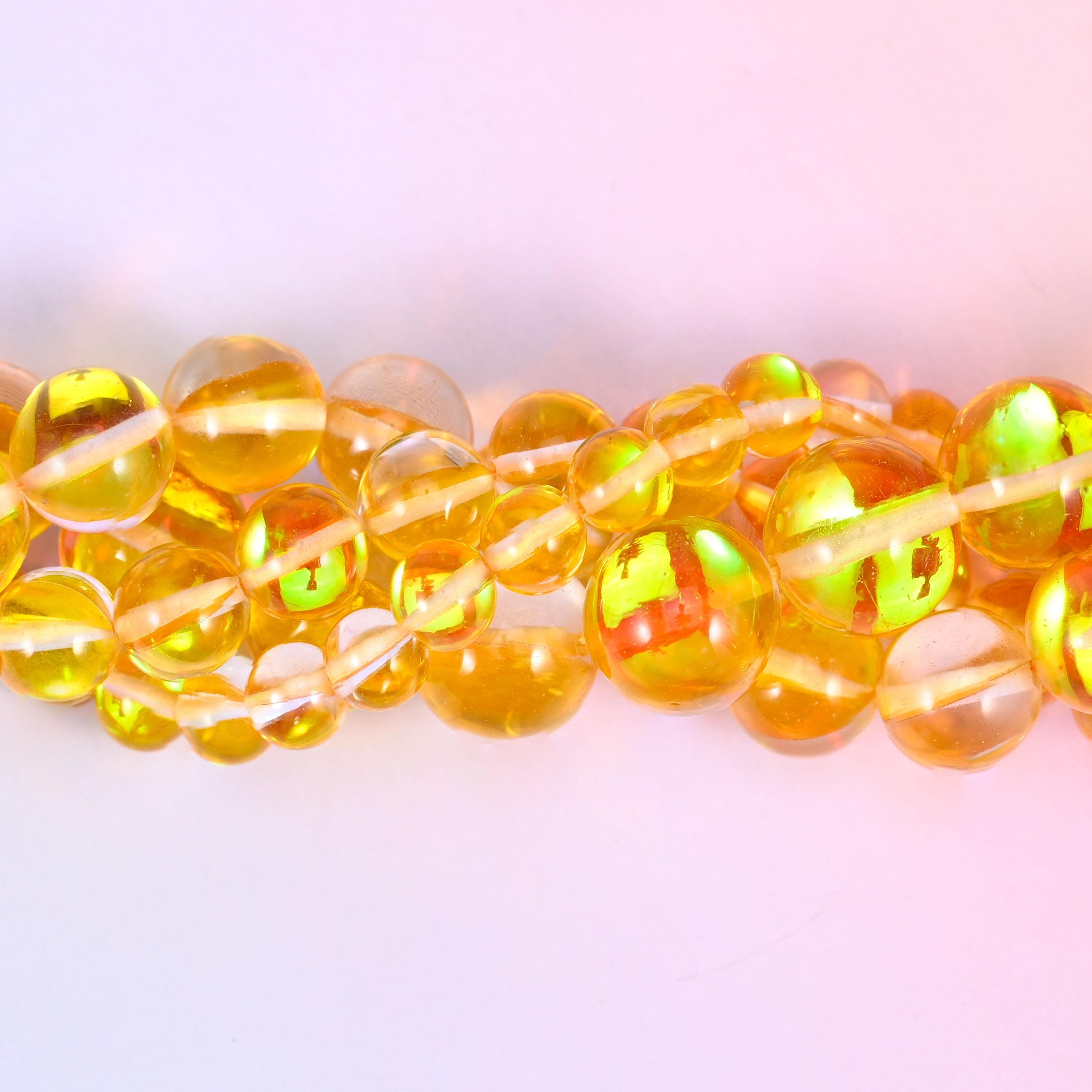 Mystic Aura Yellow Round Glass Beads, sold per 15 inch strand