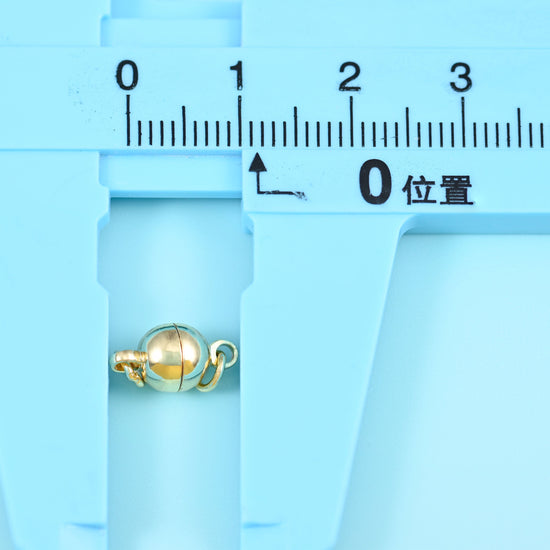 18K Gold Filled Round Magnetic Clasp, a polished gold ball that splits in half with a magnet inside