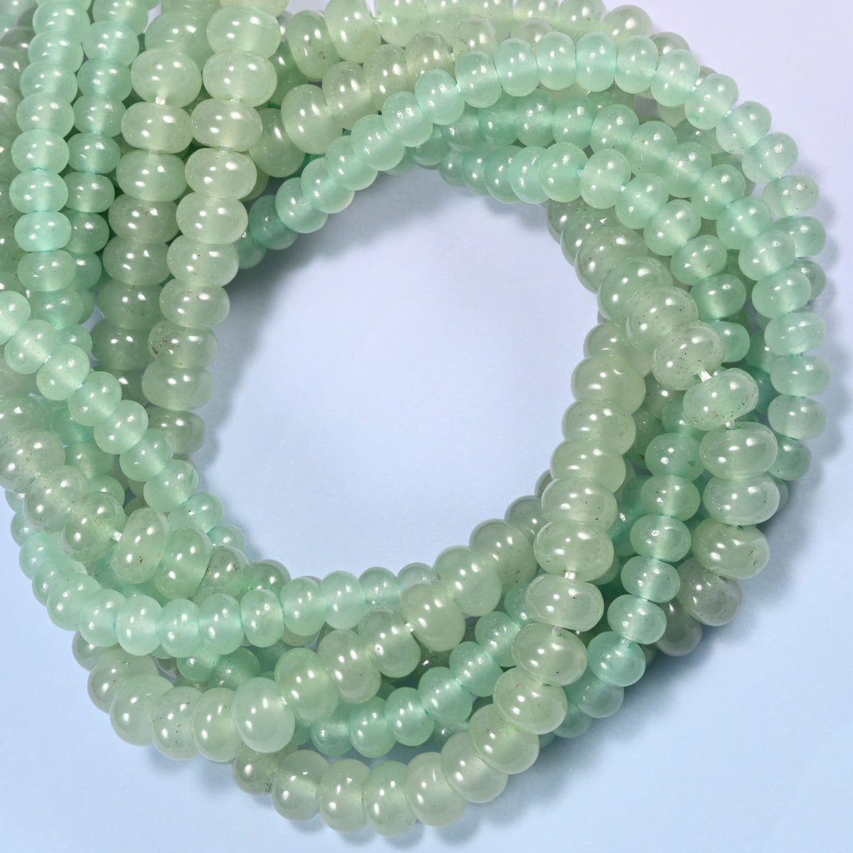 Green Aventurine gemstone rondelle beads coiled into a ring, 4x6mm and 5x8mm on 15.5 inch strands