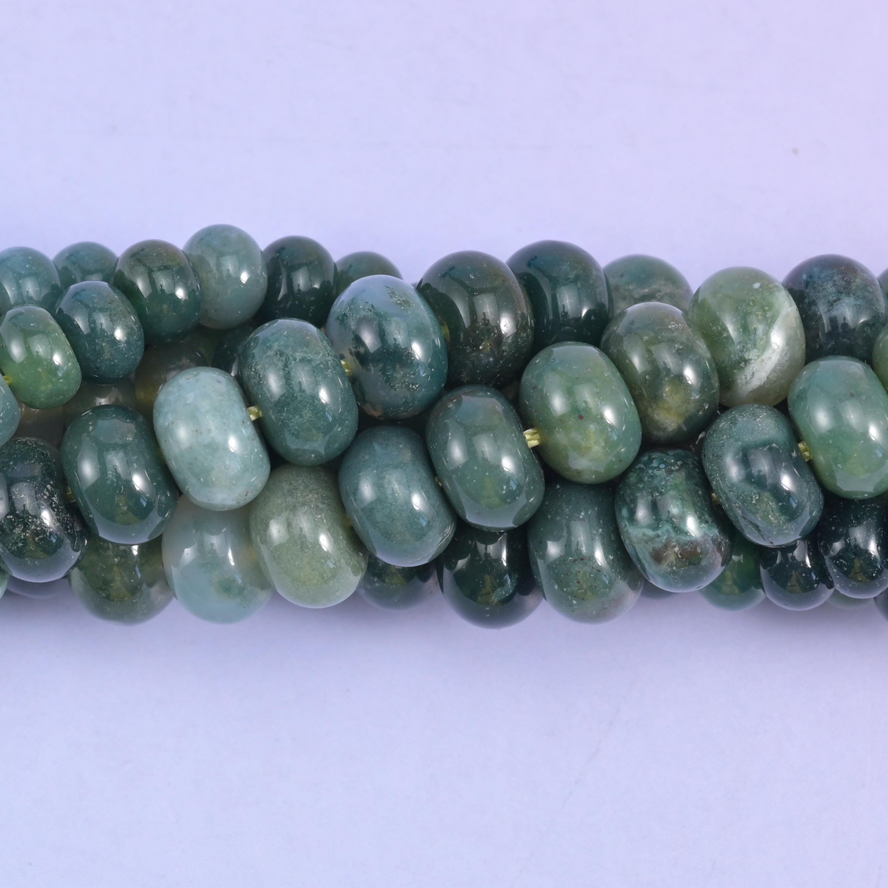 Rondelle cut Moss Agate beads with a smooth polished finish