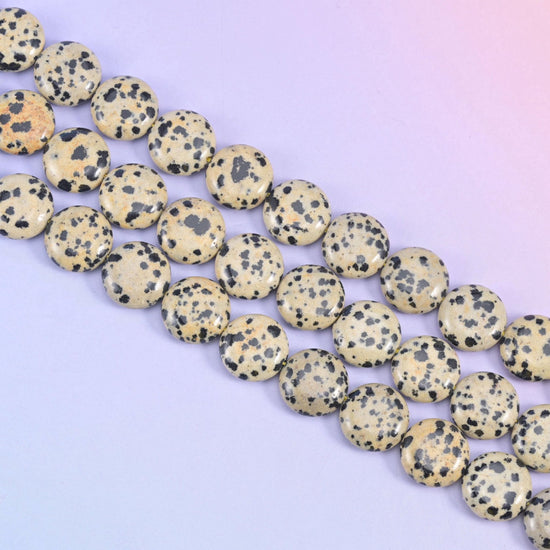 Dalmatian Jasper Smooth Coin Beads in oatmeal cream with inky black spots