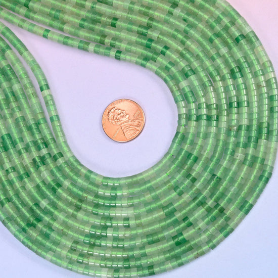 Natural Green Aventurine smooth heishi disc beads in fresh spring green with a soft translucent glow, finished with a polished, sophisticated look.