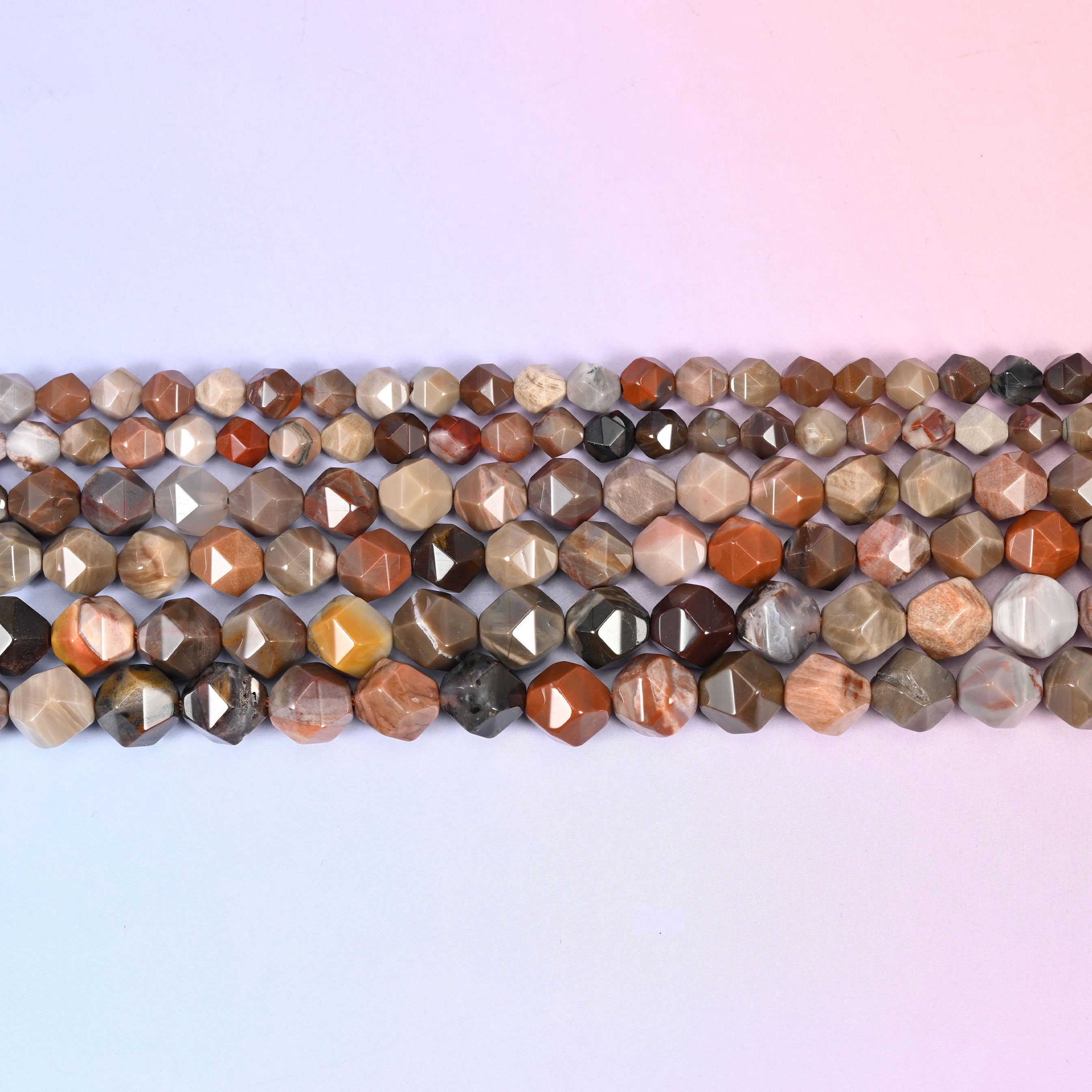 Petrified Wood in warm taupe, cream, rust and chocolate showing natural grain