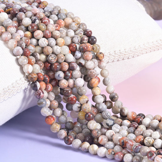 Mexican Crazy Agate Smooth Round Beads, cream and warm grey with rust red and mushroom brown banding