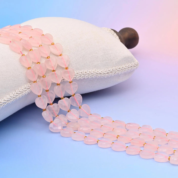 Natural Rose Quartz faceted heart beads, translucent pale pink with a soft frosted finish