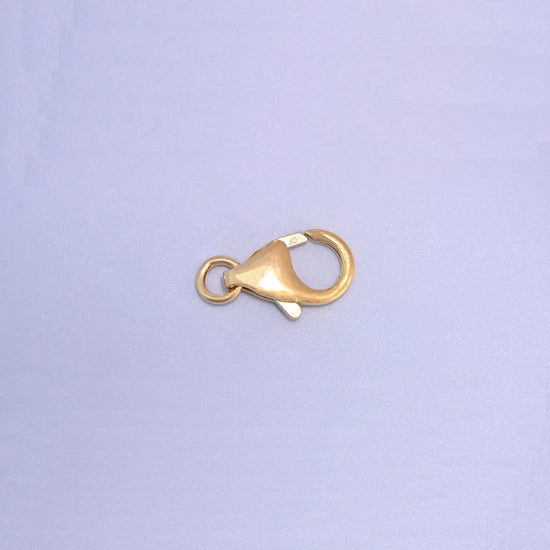 14K gold filled lobster clasp, 5x8.2mm, jump ring at the left with the trigger mechanism visible