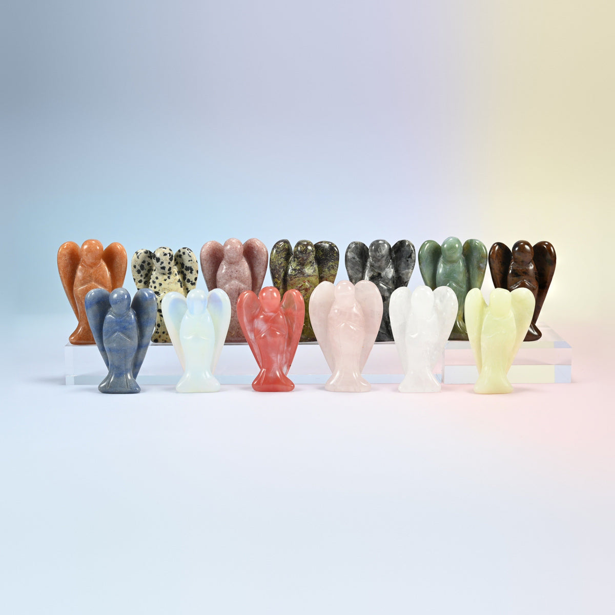 Two rows of natural gemstone guardian angel carvings in many colors, part of the 26-stone 2 inch angel set