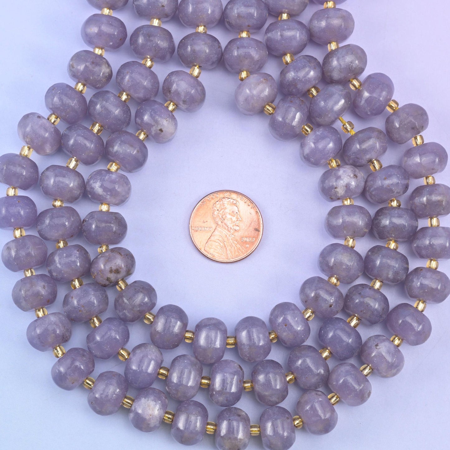 Purple Lepidolite smooth pumpkin beads in a soft, calming purple-lilac tone with a smooth, polished finish