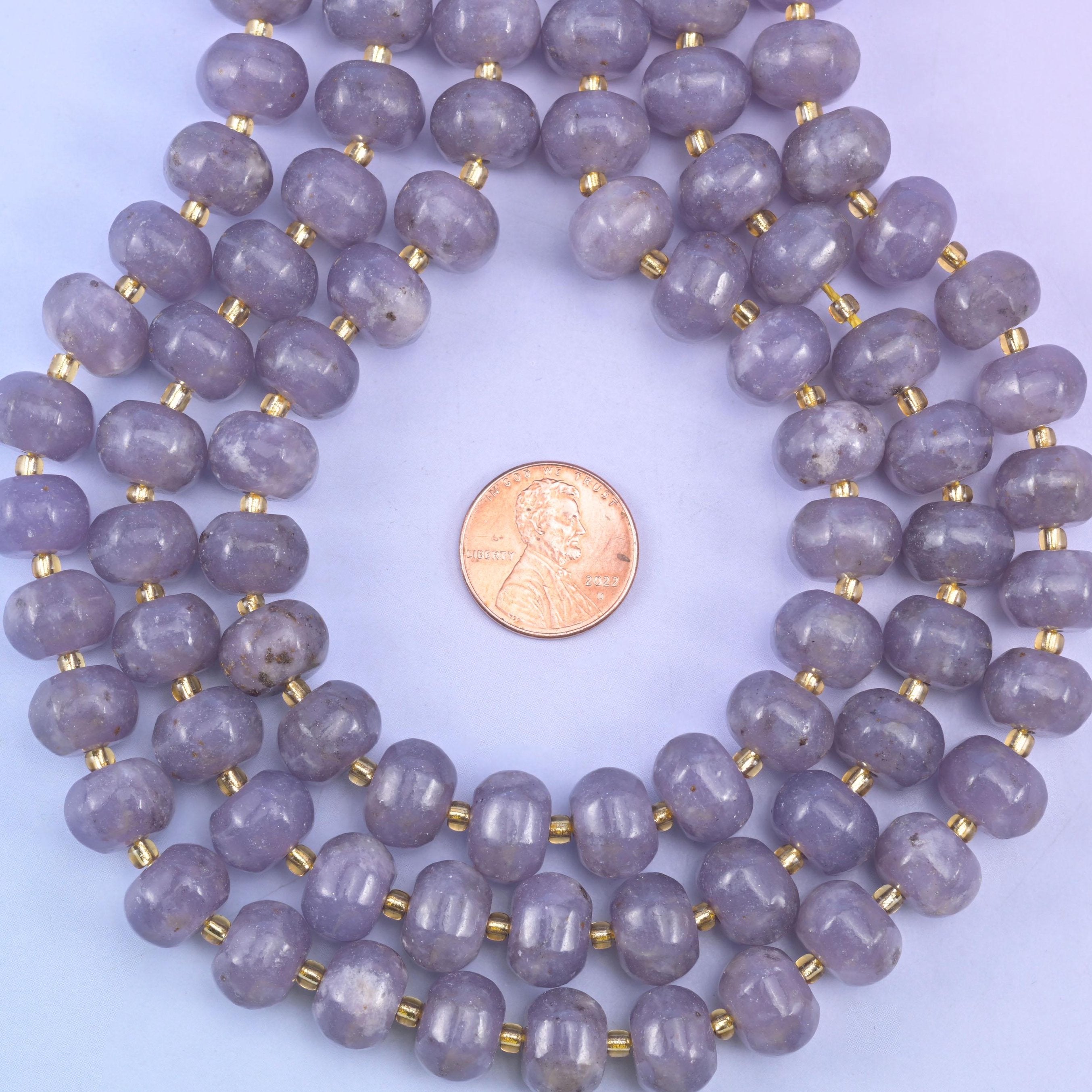 Purple Lepidolite smooth pumpkin beads in a soft, calming purple-lilac tone with a smooth, polished finish