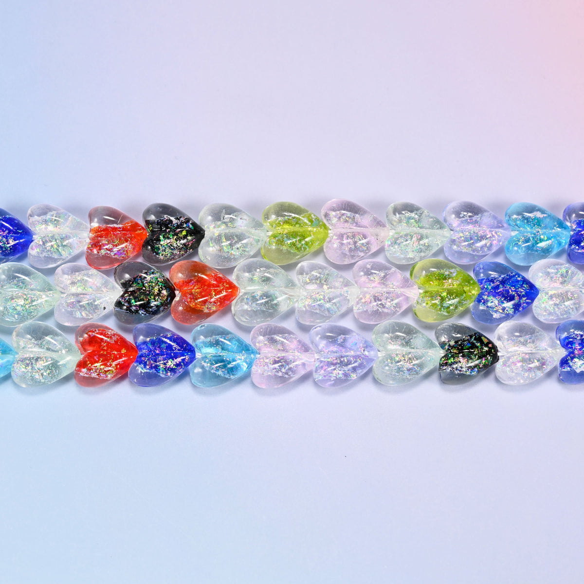 Iridescent Heart Glass Beads in clear, ice blue, cobalt, lime, coral red and speckled black